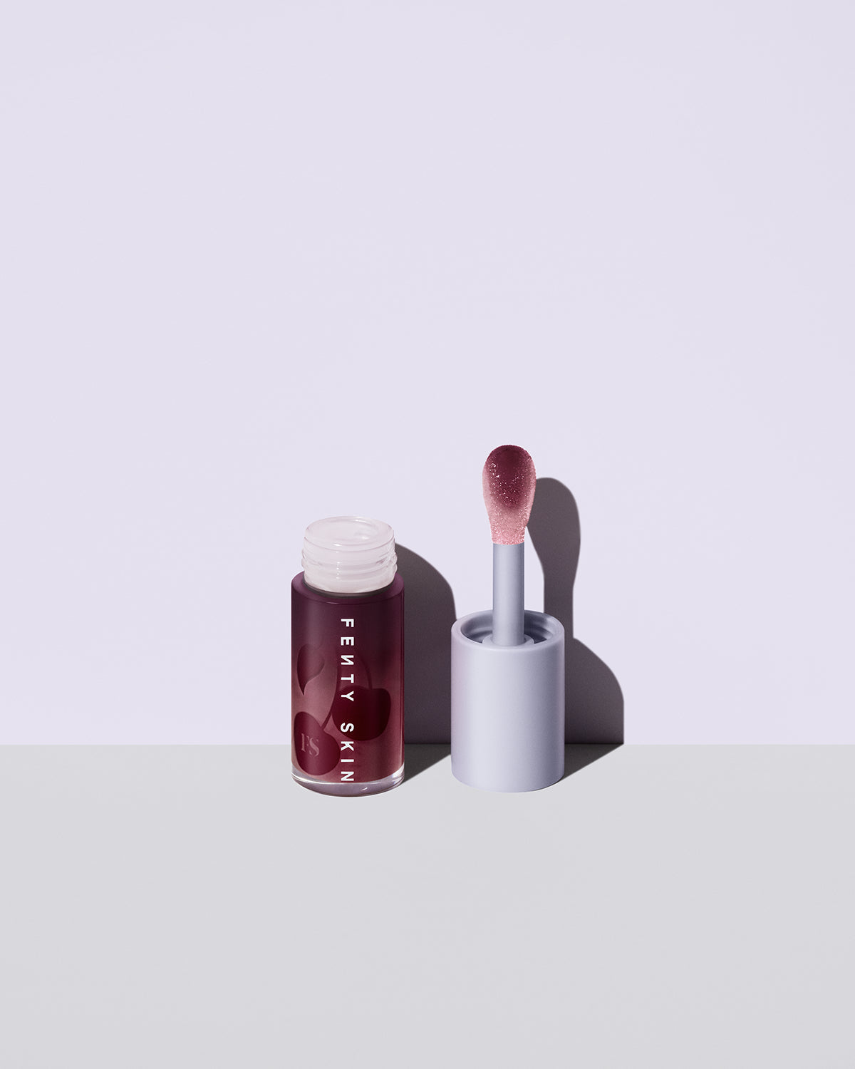 Fenty Treatz Hydrating + Strengthening Lip Oil — Black Cherry